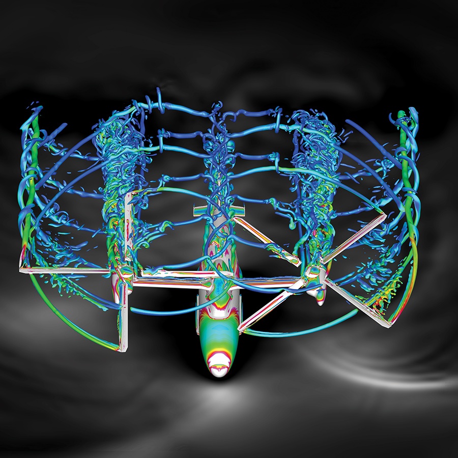 A colorful computer-generated visualization of airflow patterns around a rotating vertical-axis wind turbine, displayed against a dark background.