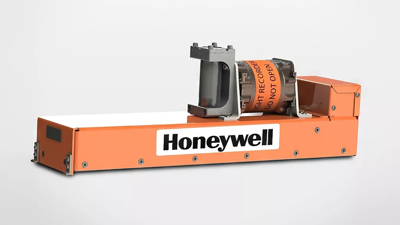 An orange flight data recorder with a metal attachment and a label that reads "Honeywell" is pictured on a plain background.