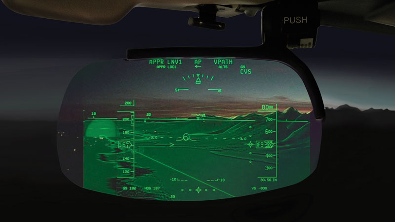 View from a cockpit at dusk, showing a heads-up display with flight data overlaying a mountainous horizon.